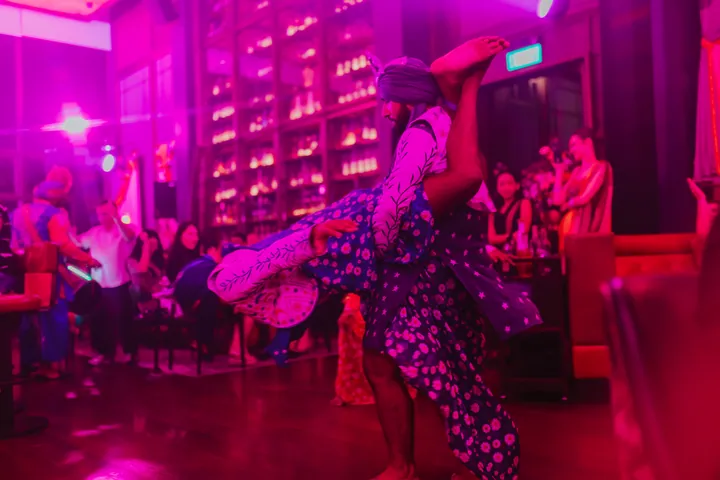 Diwali 2024: Full-room colour wash with dancers between the tables