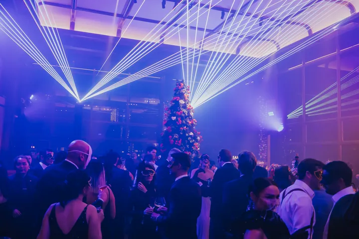 New Year's Eve 2024 · Masquerade: White laser fans over the dance floor