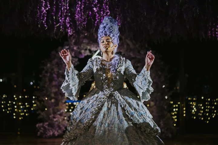 New Year's Eve 2025 · Wisteria: A costumed performer beneath the wisteria