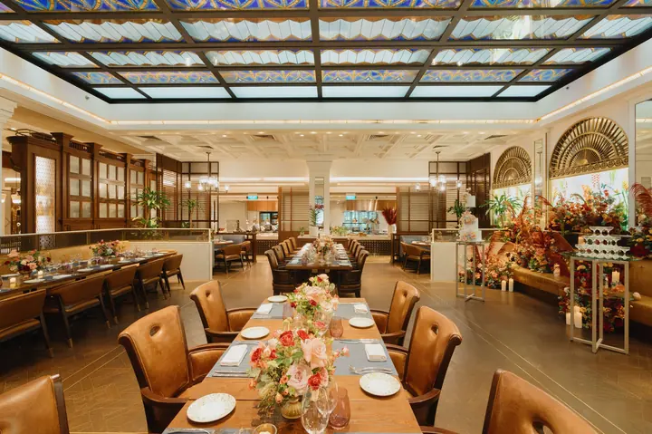 15 Stamford dining hall under a stained-glass skylight