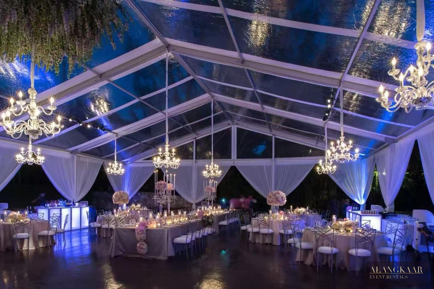 Clear roof tent at night with fairy lights