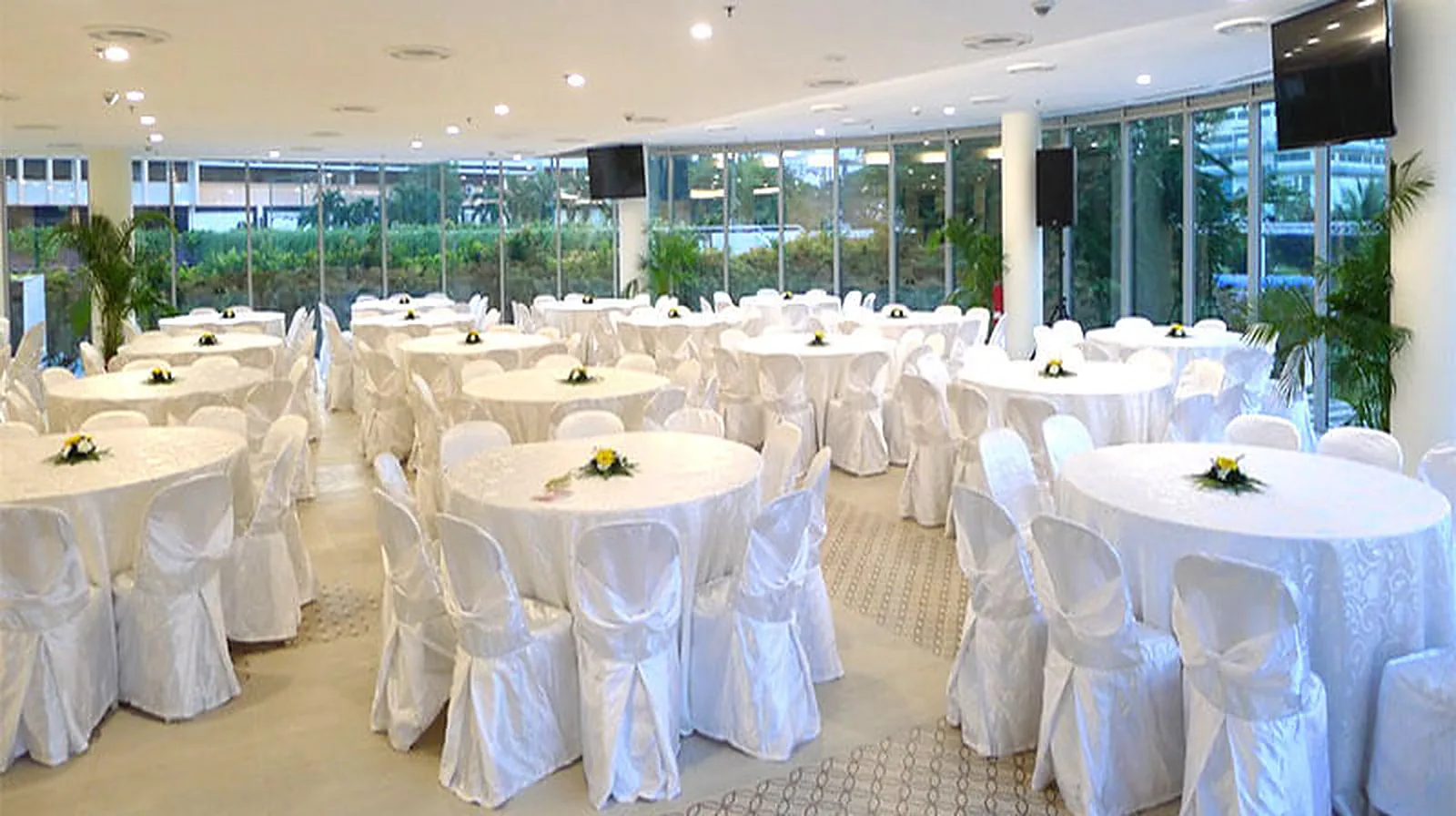 The Lee Foundation Hall at the Singapore Khalsa Association, set with round tables