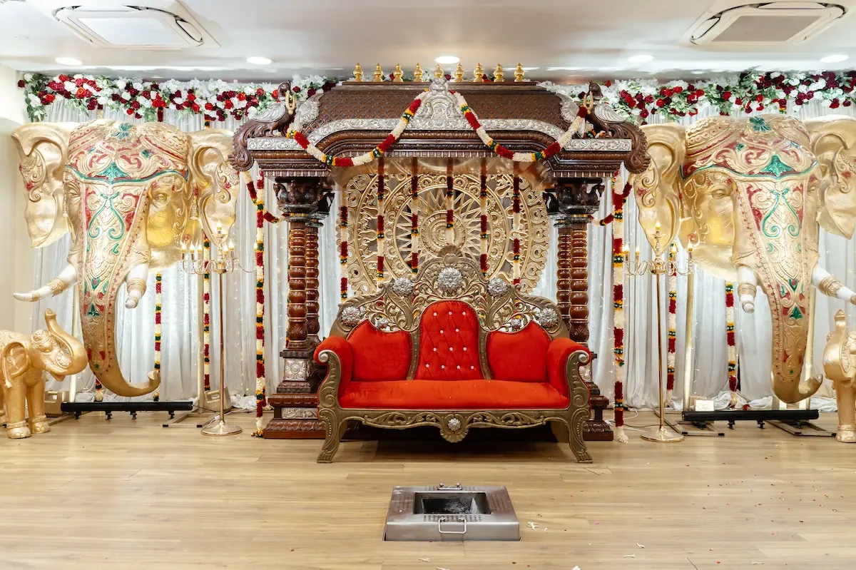 A manavarai stage with a homam kundam in front, styled by Alangkaar