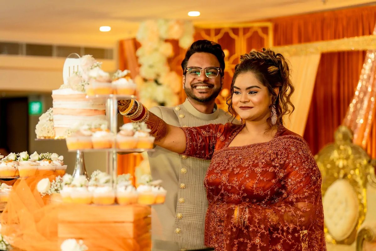 Bride and groom at their wedding reception, photographed by Alangkaar Studio